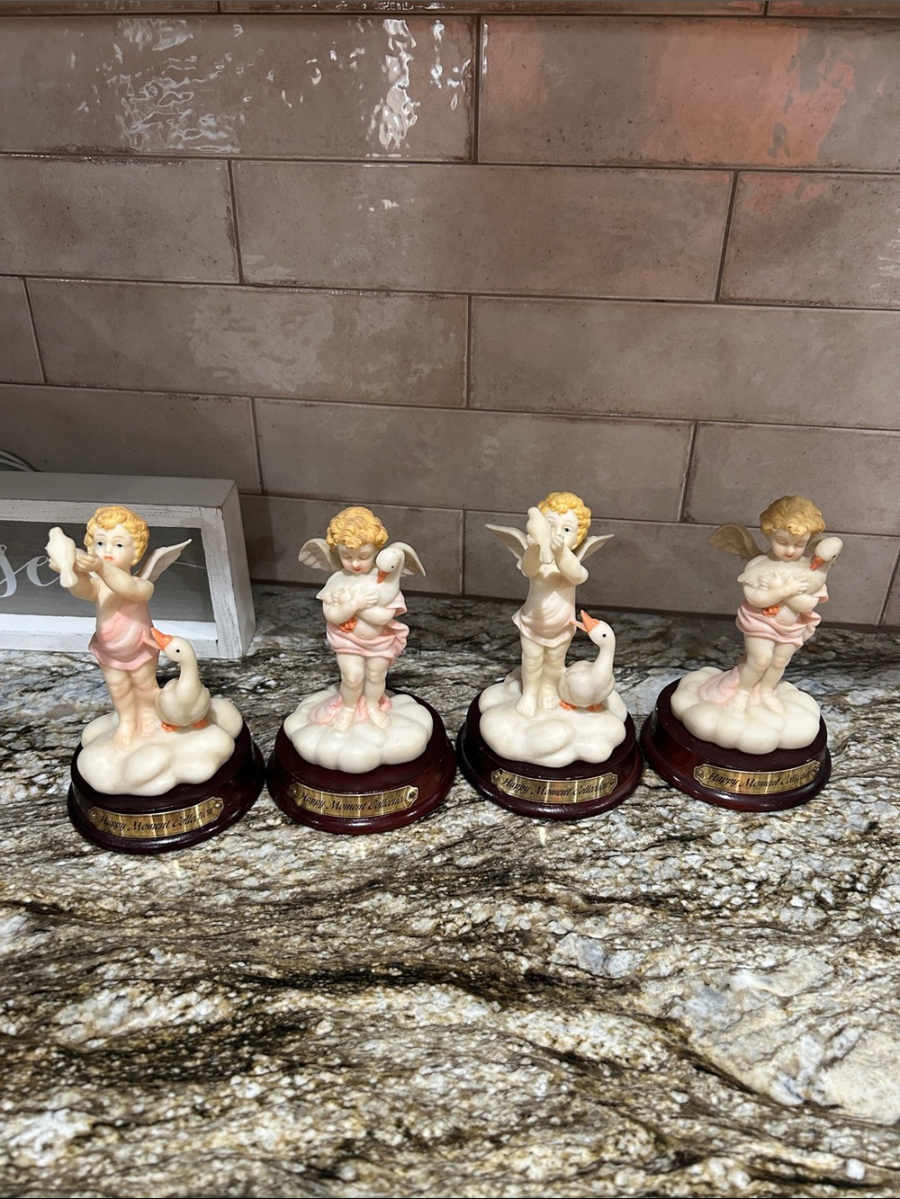 Happy Moments Collection Set of 4 Ceramic Cherub Figurines with Swan